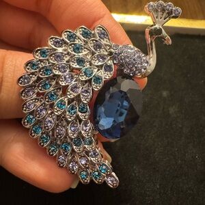 Elegant Peacock Brooch with Blue and Purple Crystals